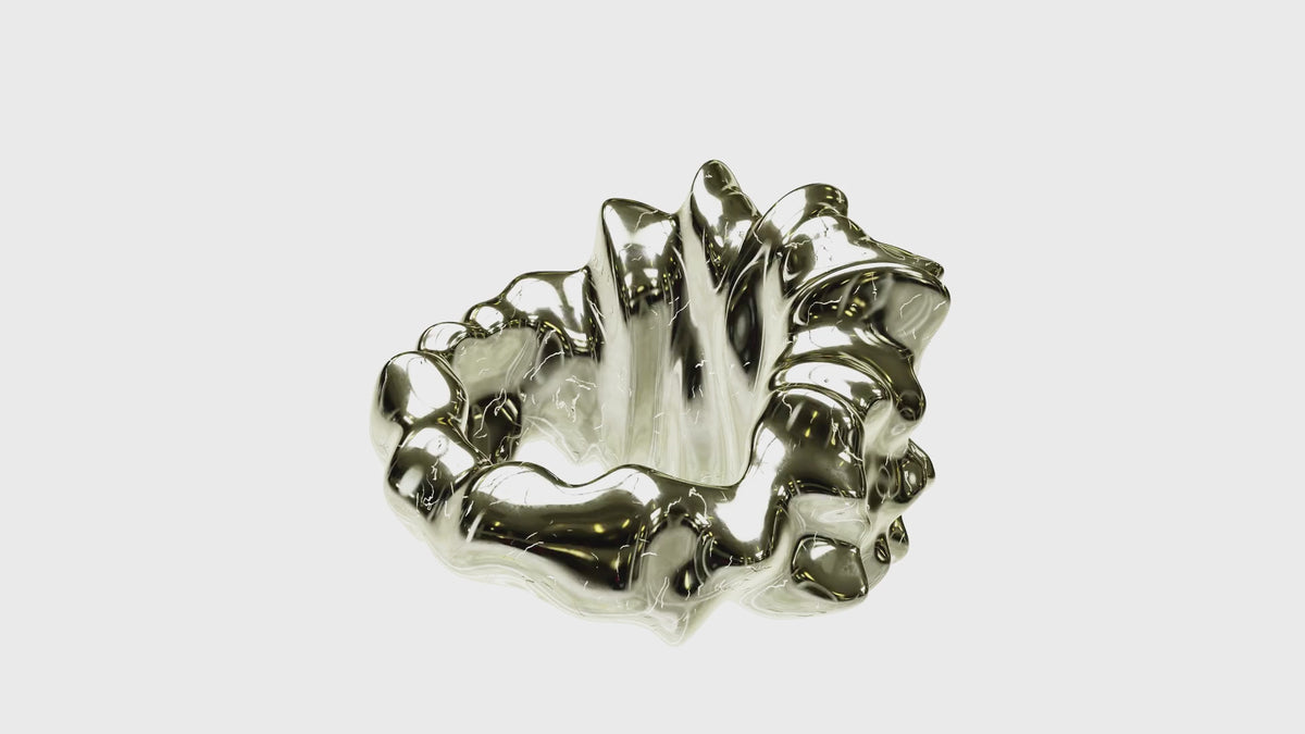 Distorted II rotating: a spiked crown of cast 925 sterling silver
